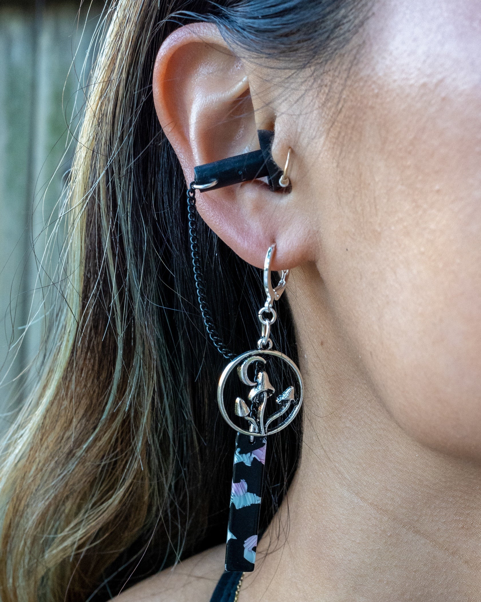 black mushroom earplug earrings